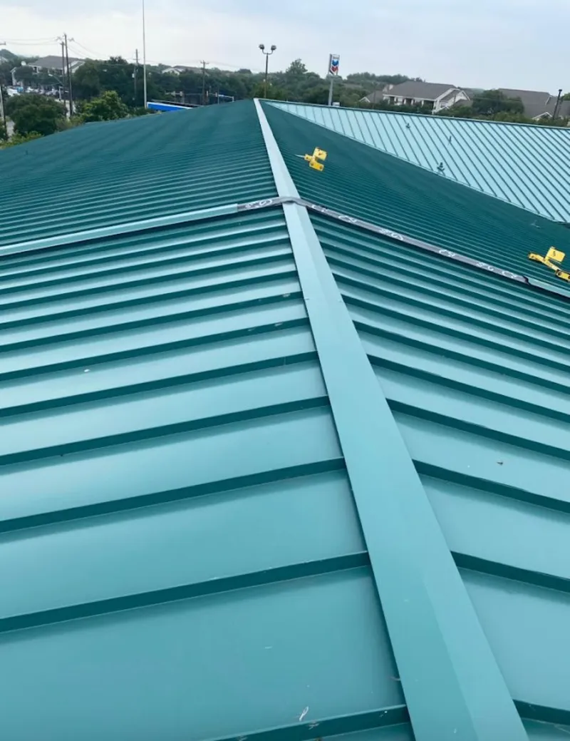 Green commercial metal roof ridge and valley for Metal Roof Repair in Niles